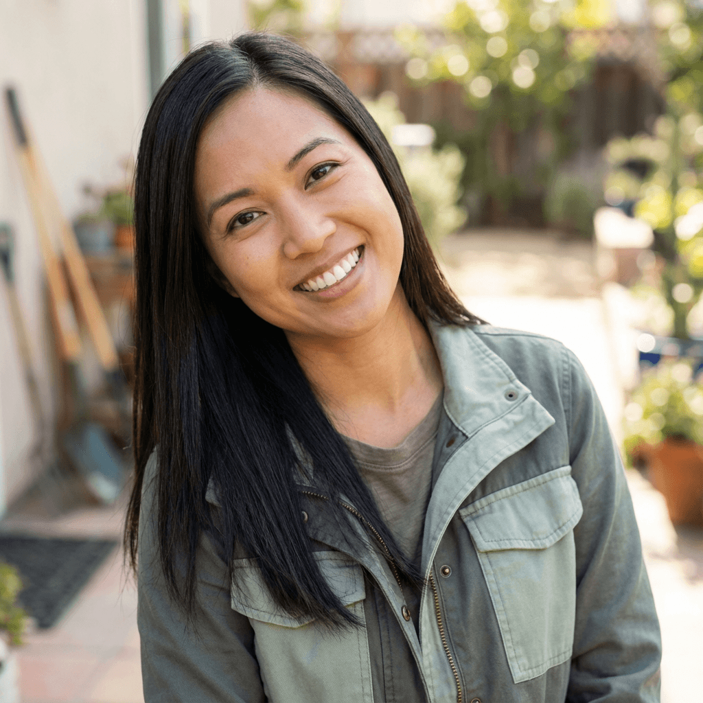 Female homeowner in her late 30s, White, casual friendly appearance with a welcoming smile