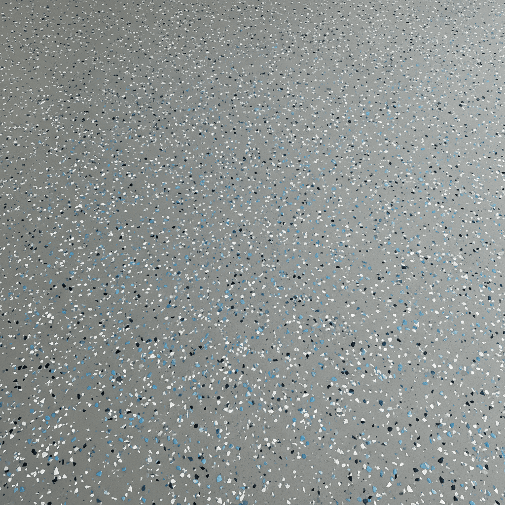 Finished garage floor with gray epoxy coating and decorative chips